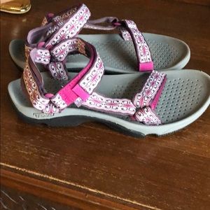 New fushia pink Teva sandals...never worn.